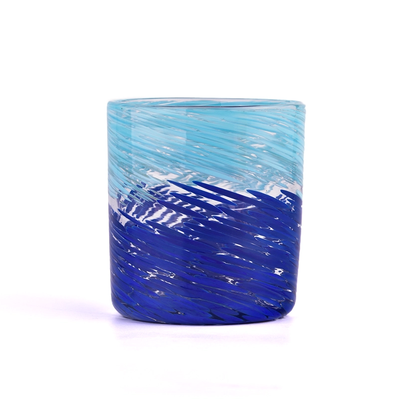 blue glass candle vessel hand colorful candle jars