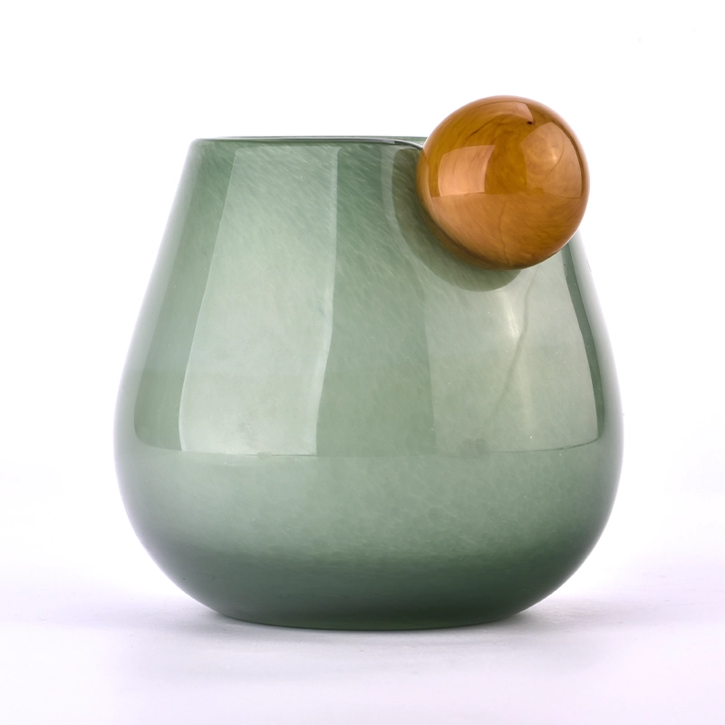 Mouth blown glass candle jars with round handle 