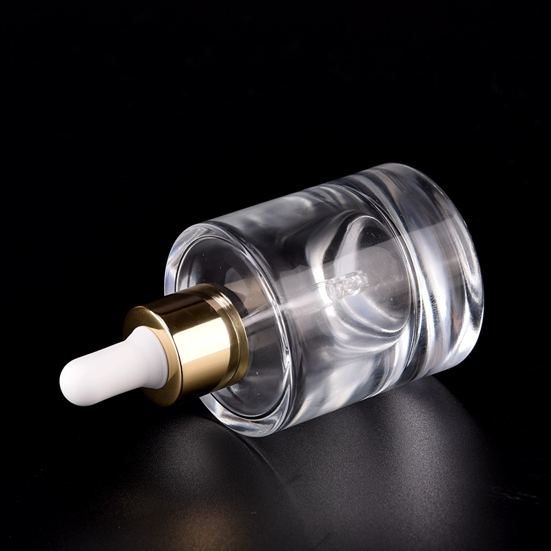 Newly design for luxury 50ml glass bottle with gold dropper for wholesale