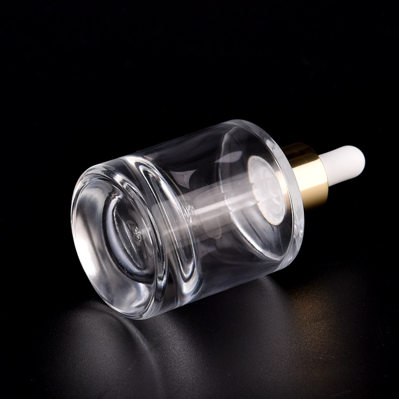 Newly design for luxury 50ml glass bottle with gold dropper for wholesale