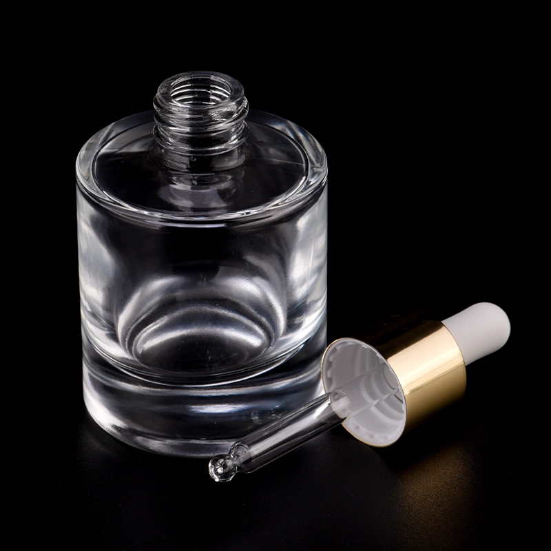 Newly design for luxury 50ml glass bottle with gold dropper for wholesale