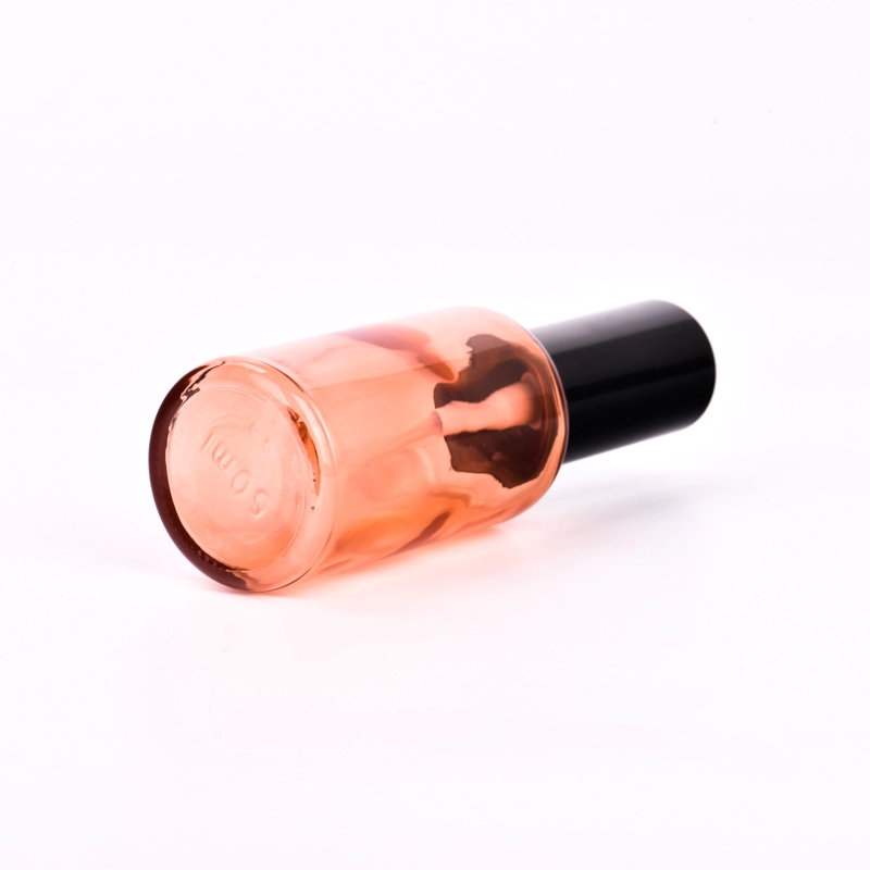 Customized 50ml-100ml shiny colored glass bottle with shiny black cap for wholesale