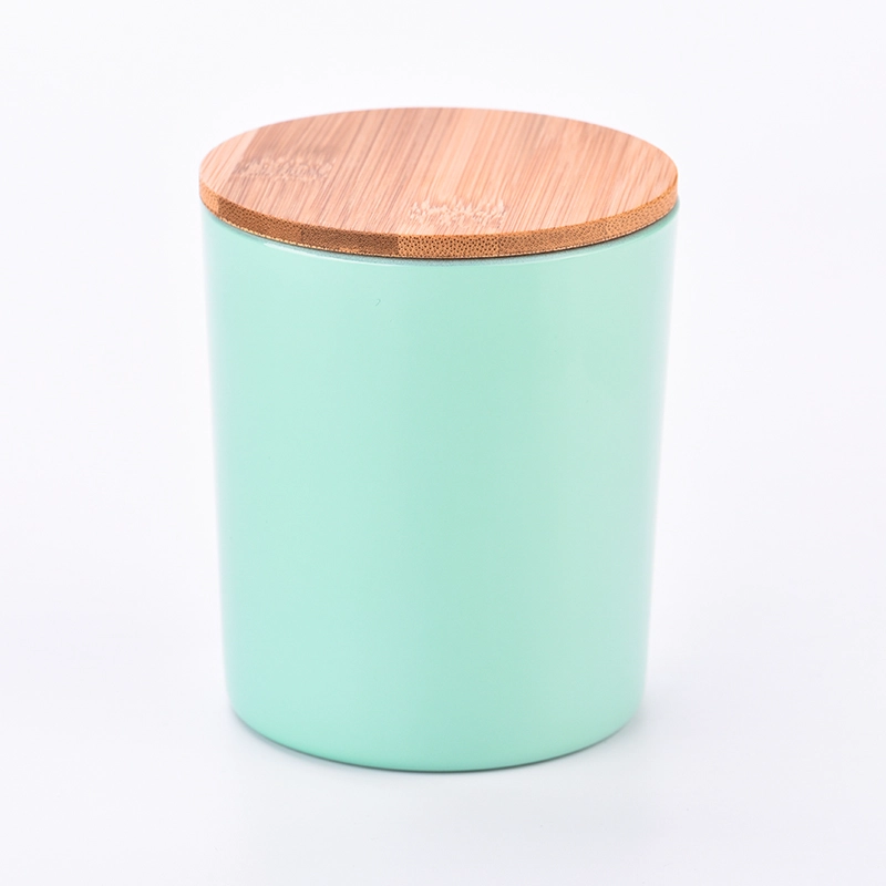 spraying color 8oz glass candle jars and lids with candle holders 