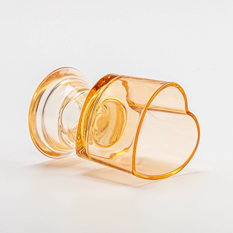 Glass vessel yellow heart candle jar with glass base