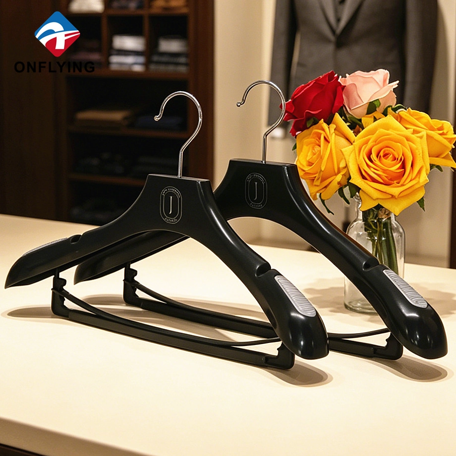 Китай High Quality Shop Custom logo Anti-slip Shoulder Black Plastic Suit Hanger with bar Factory China - COPY - p9svdo производителя