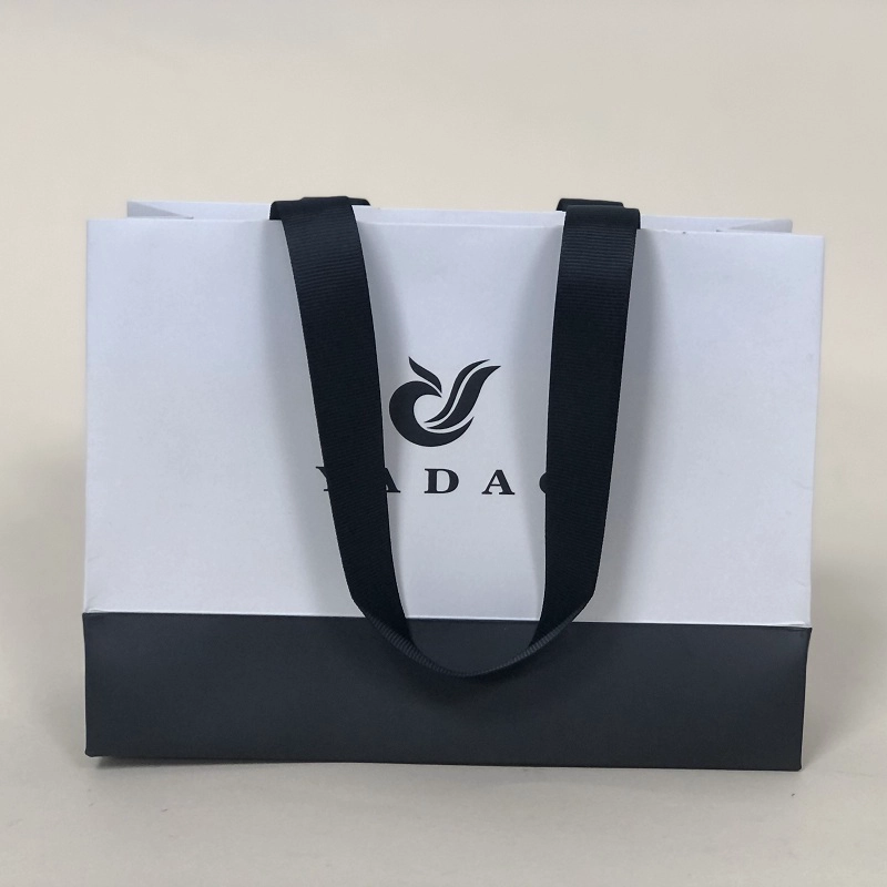 Chiny Yadao CMYK drukowana torba papierowa niestandardowa torba z logo wstążka z uchwytem torba na prezent opakowanie na prezent producent