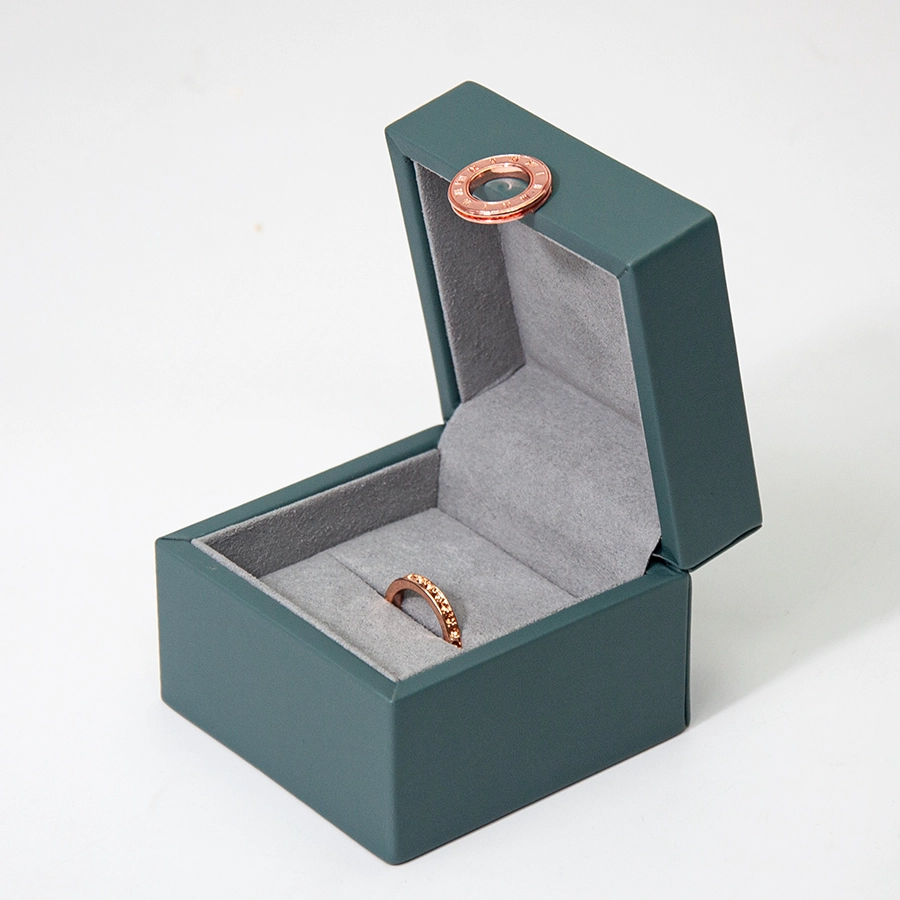China Popular jewelry brand packaging luxury leather diamond ring box debossed logo manufacturer