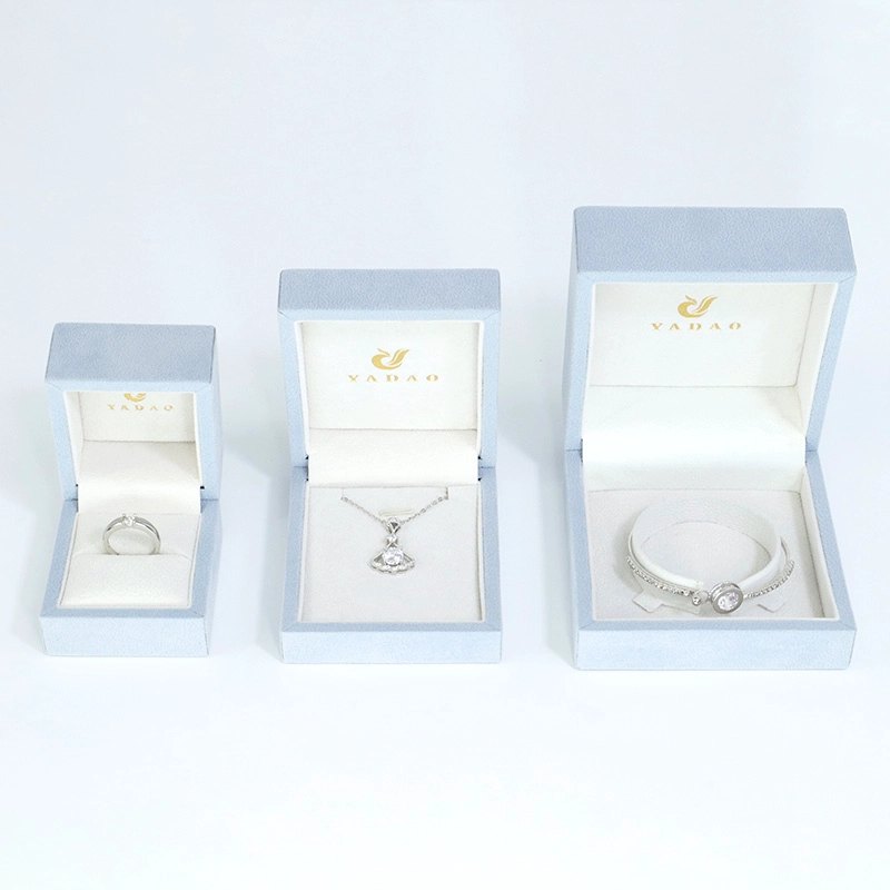 Gratis design luksus smykkeskrin brugerdefineret farve granulær fløjl ring øreringe halskæde armbånd armbånd boks
