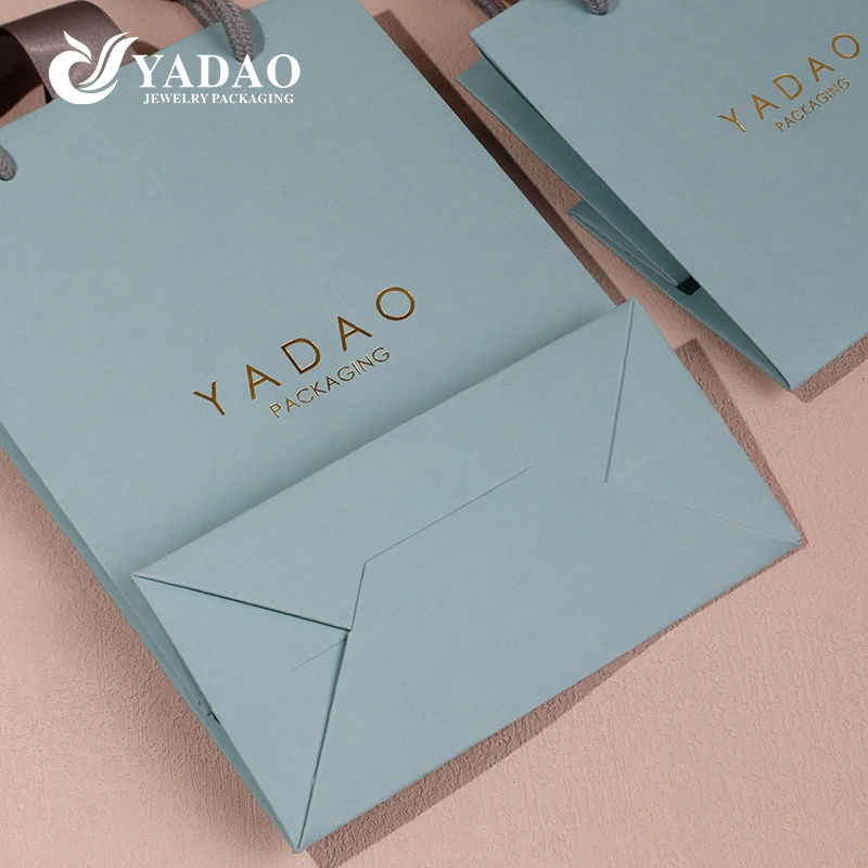 Sacs cadeaux en papier sur mesure, marques de bijoux de parfum de luxe, boîte de montre, sac à poignée d'emballage