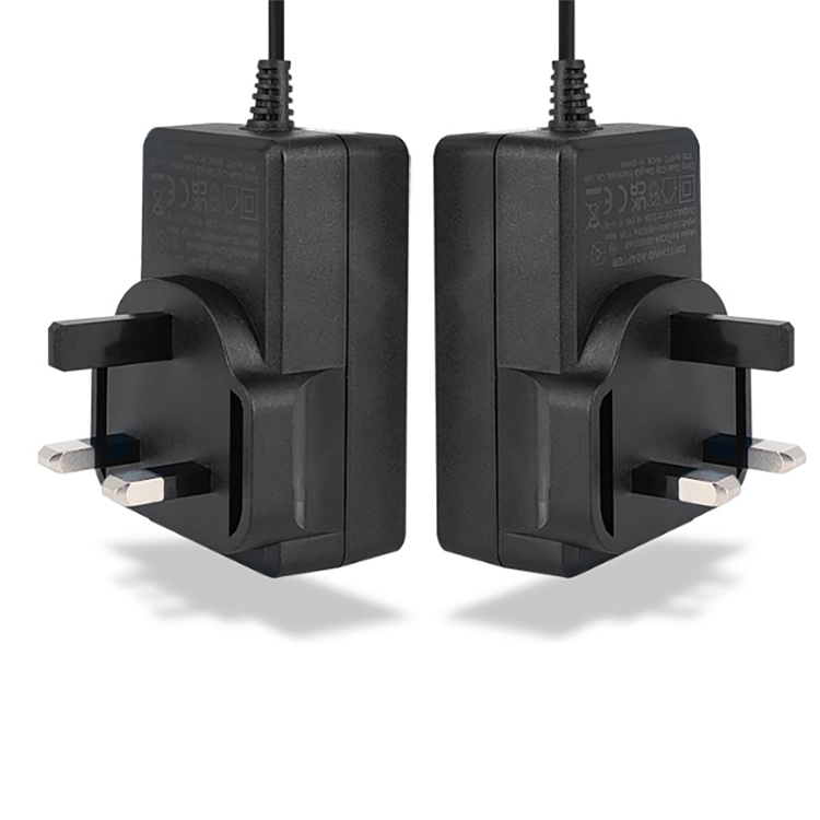 Çin FCC İngiltere Tak 24W 12V 2A Anahtarlama Güç Kaynağı Duvara Monte Adaptör AC - DC Adaptörü üretici firma