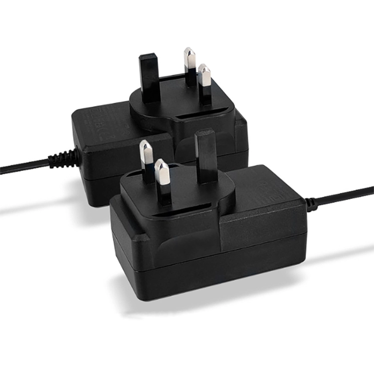Çin FCC İngiltere Tak 24W 12V 2A Anahtarlama Güç Kaynağı Duvara Monte Adaptör AC - DC Adaptörü üretici firma