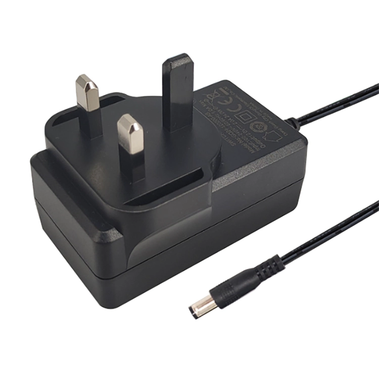 Çin FCC İngiltere Tak 24W 12V 2A Anahtarlama Güç Kaynağı Duvara Monte Adaptör AC - DC Adaptörü üretici firma