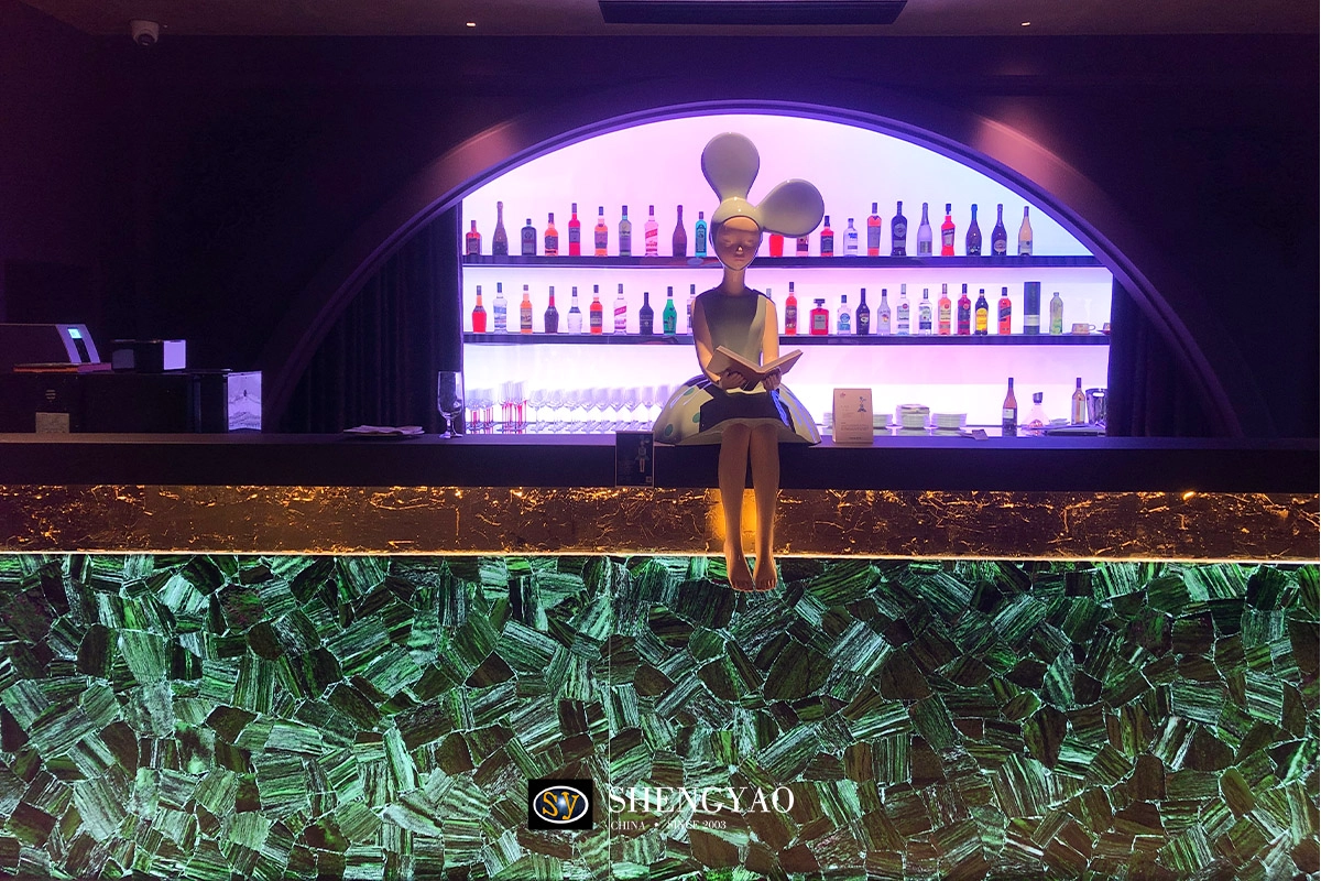 backlit red emerald bar counter