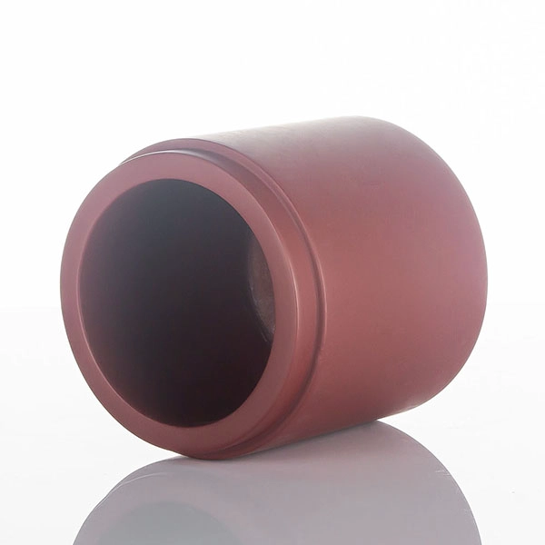 red concrete candle holder