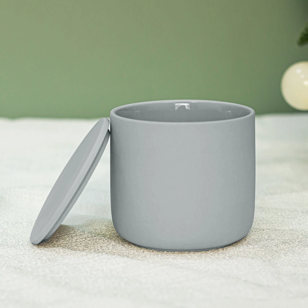 Recipiente de vela de porcelana cinza claro com tampa