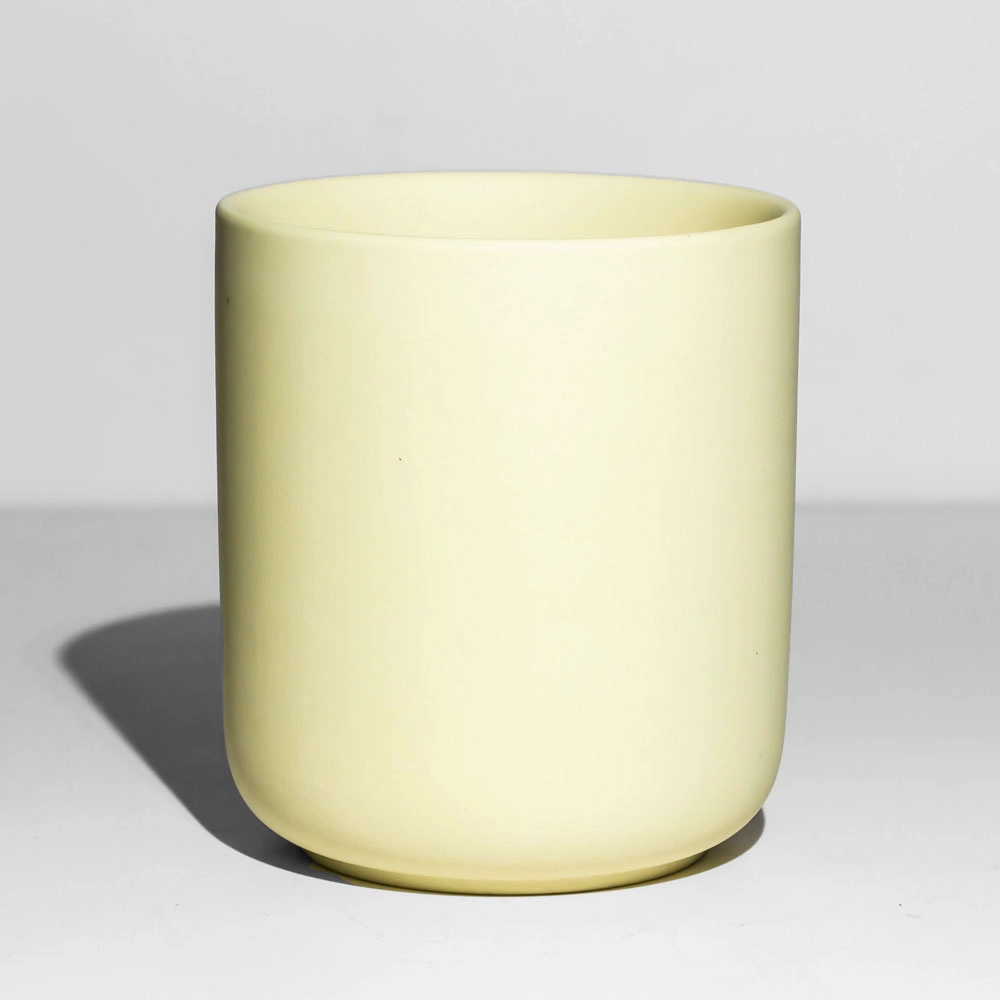 Elegante vaso de vela de cerámica amarillo nórdico