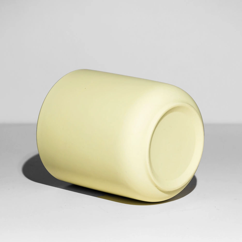 Elegante vaso de vela de cerámica amarillo nórdico