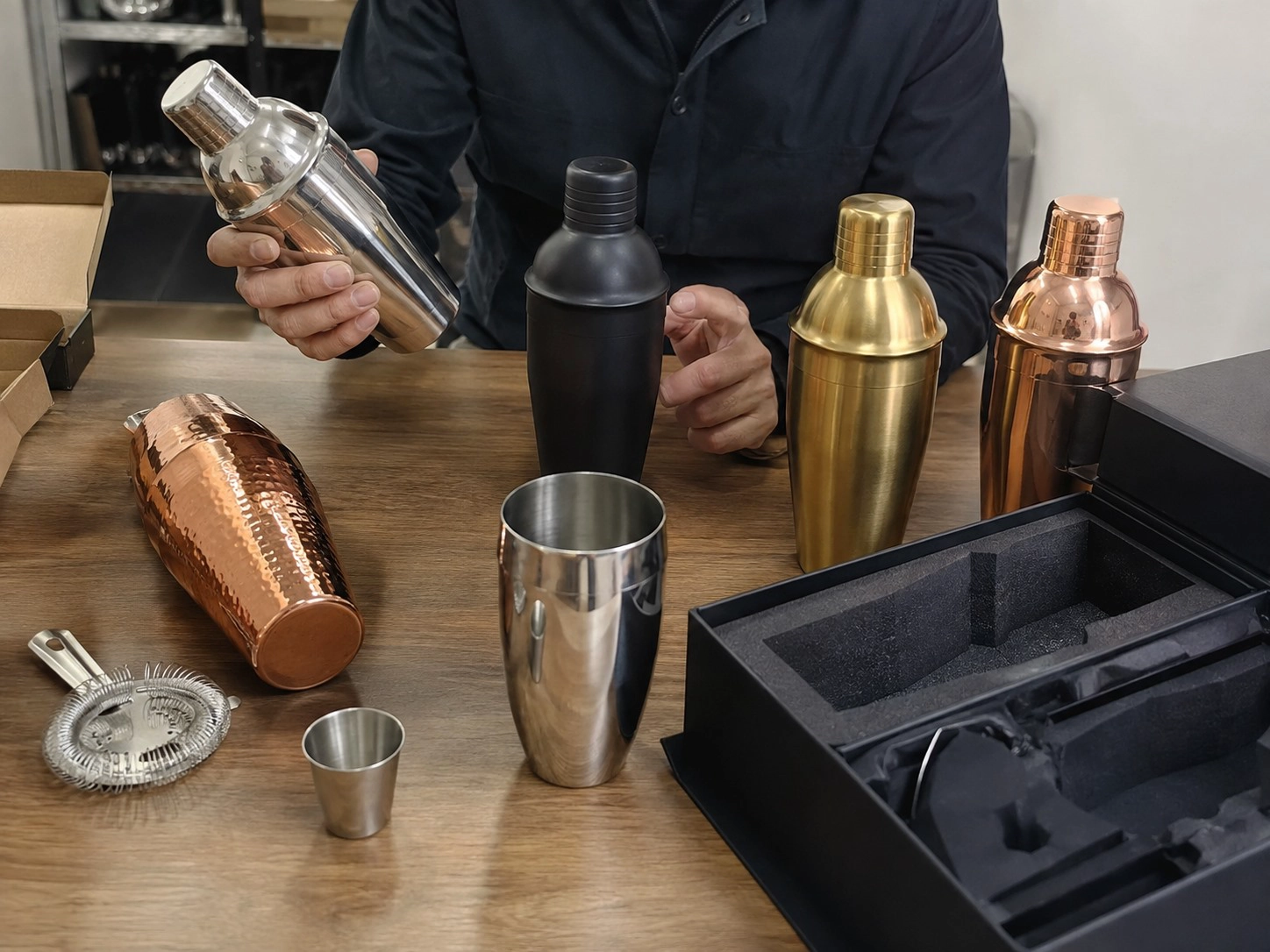 Cocktail shaker finish, logo and packaging inspection with stainless steel, black, gold and copper shaker samples