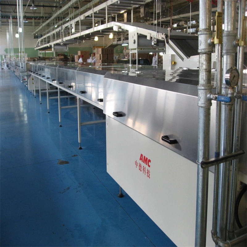 porcelana Túnel de enfriamiento de bocadillos de chocolate completamente automático de buen rendimiento, el más vendido de AMC fabricante