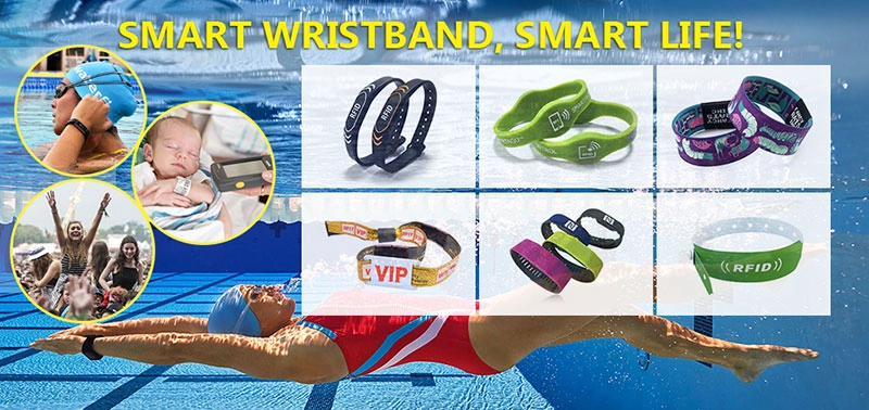 Swimmers get wristbands from the club