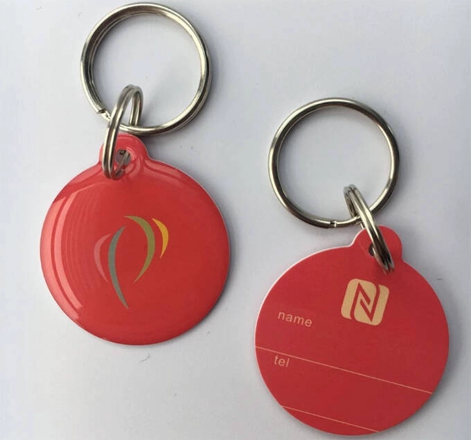 الصين يقوم مصنع Chuangxinjia بتصنيع علامات NFC البلاستيكية مع رقائق Topz512 الصانع