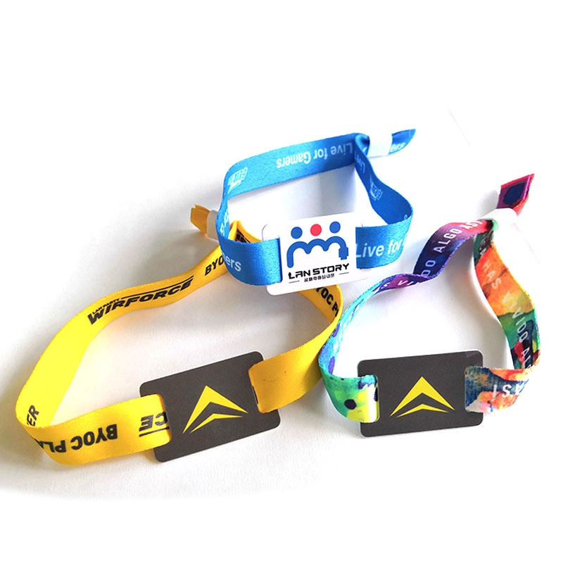 porcelana Recién Diseño Venta caliente de la tela RFID de la pulsera de la pulsera de encargo del logotipo de los eventos fabricante