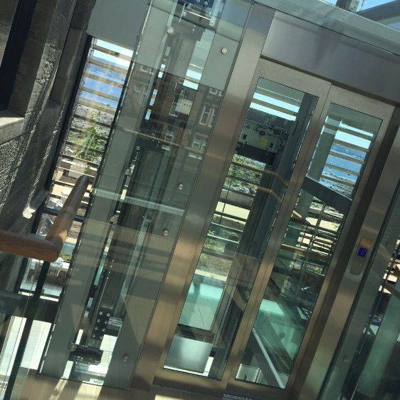Customized 5+5mm 6+6mm PVB SGP laminated safety glass elevator lift manufacturer China