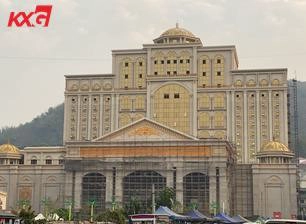 Golden coated curtain wall glass.