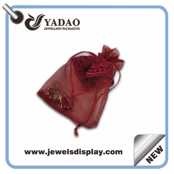 China Beautiful popular hot-sale transparent lace custom size and color good look silk pouch for jewelry packaging manufacturer