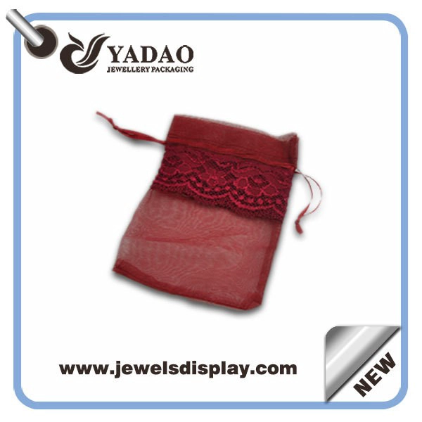 China Beautiful popular hot-sale transparent lace custom size and color good look silk pouch for jewelry packaging manufacturer
