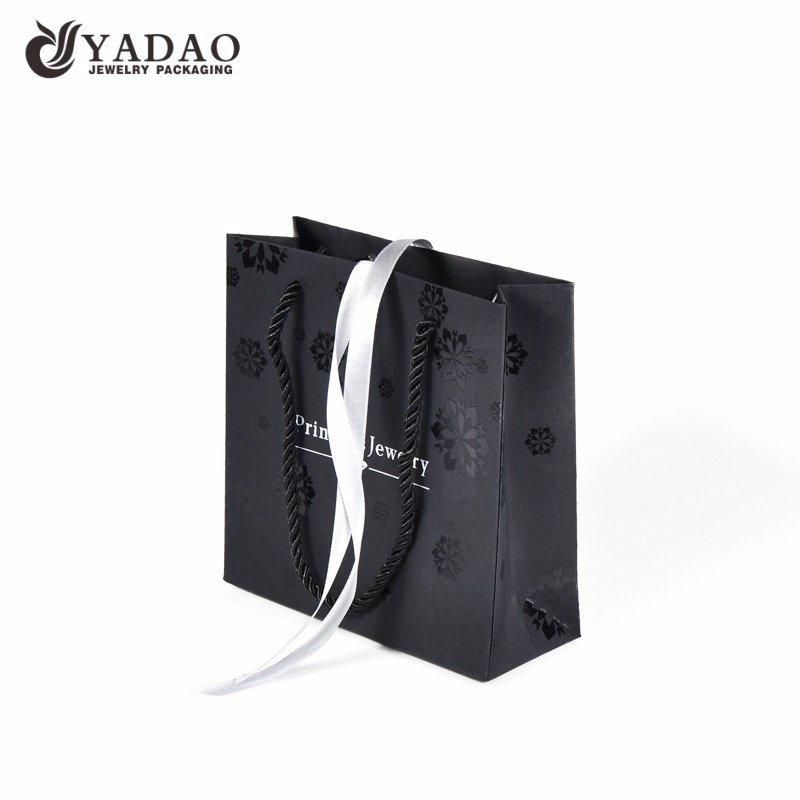 China Black fashion shopping paper packaging bag for jewelry and watch packing with free logo and color customized manufacturer