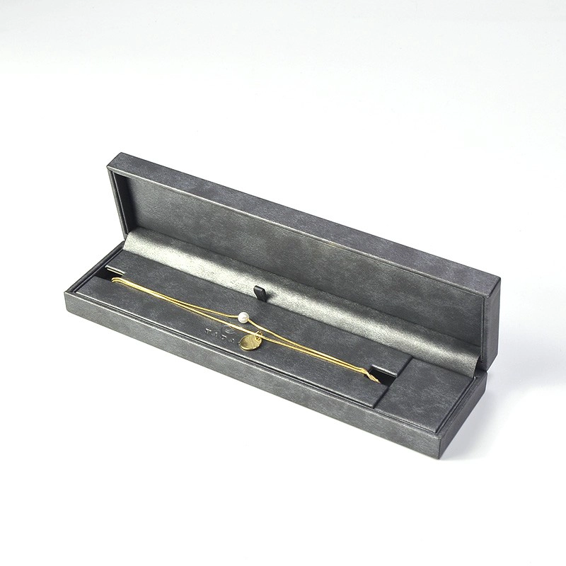 China Design and custom pu leather bracelet insert bracelet box jewelry packaging with gray color logo size manufacturer