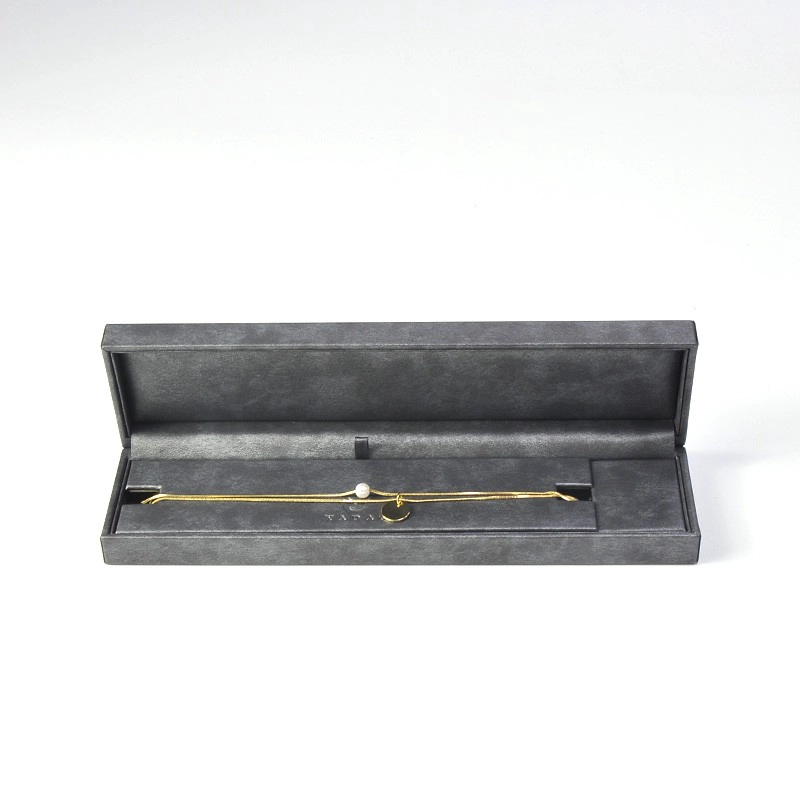 China Design and custom pu leather bracelet insert bracelet box jewelry packaging with gray color logo size manufacturer