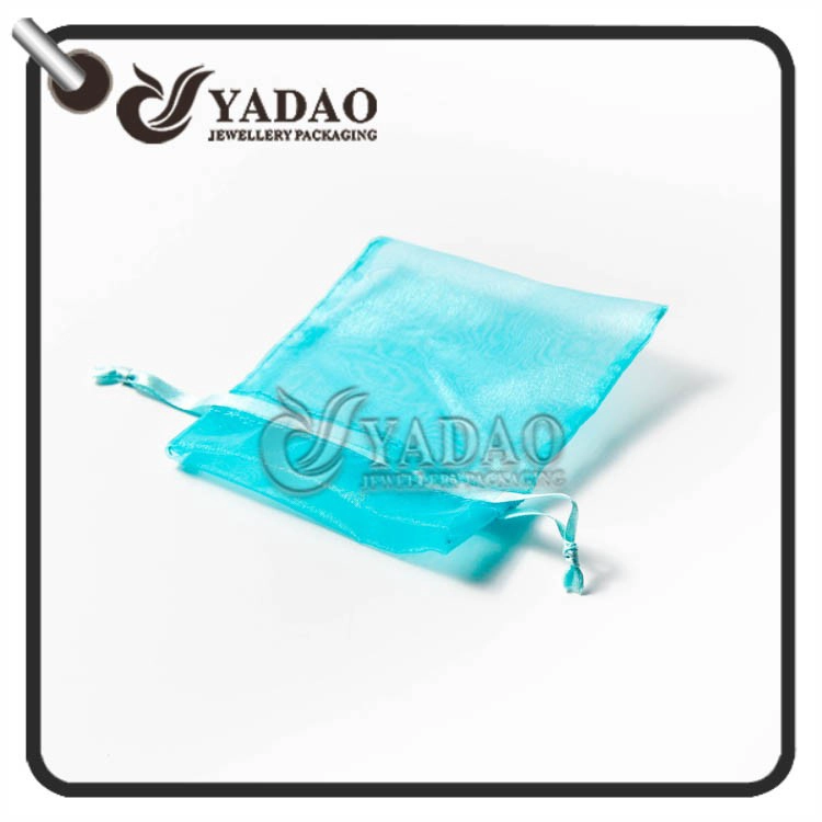 China Transparent organza pouch of all different colors and sizes with free logo printing. manufacturer