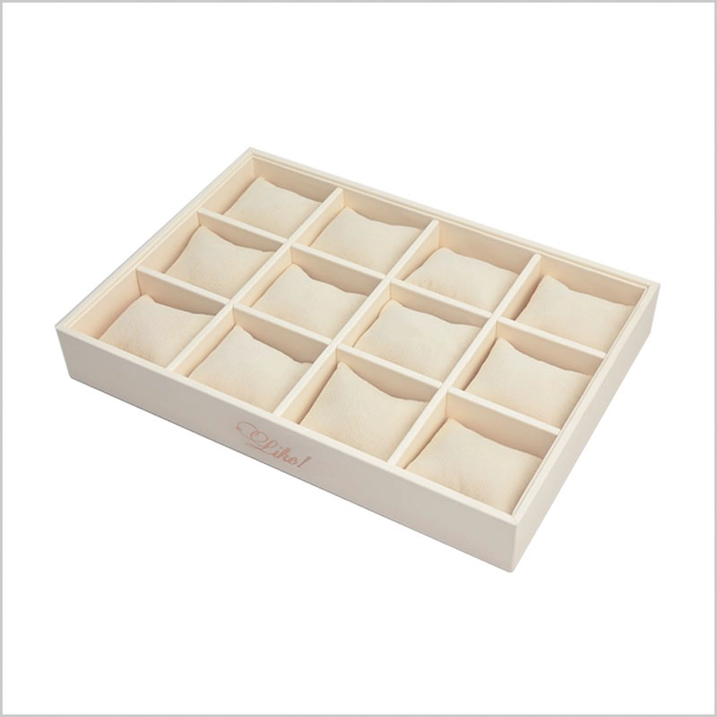 Čína Warm creamy color pu leather display stand wooden jewelry display tray 4*3 pillow tray stackable jewelry display tray výrobce