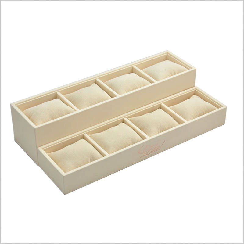 Čína Warm creamy color pu leather display stand wooden jewelry display tray 4*3 pillow tray stackable jewelry display tray výrobce