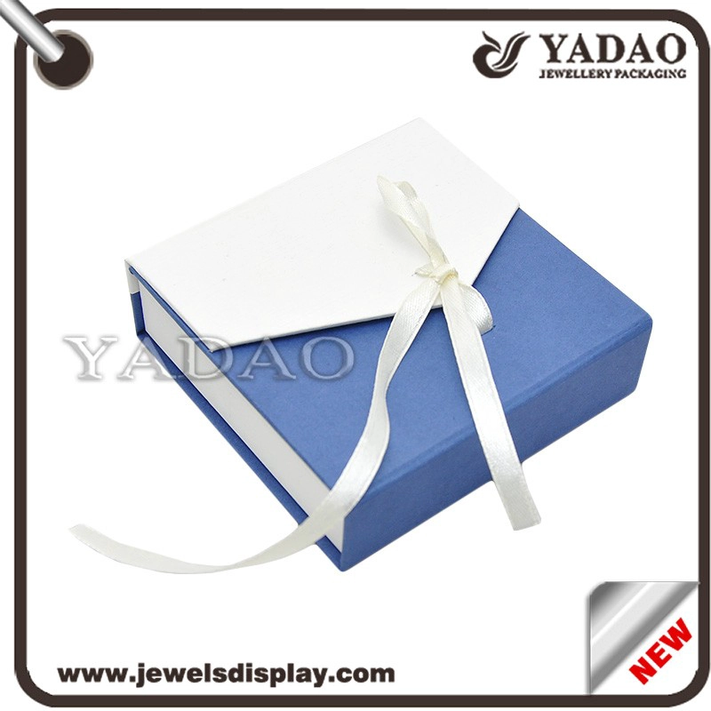 China Wholesale custom newest design white and blue color cardboard packing boxes with ribbon for jewellery storage paper gift box manufacturer