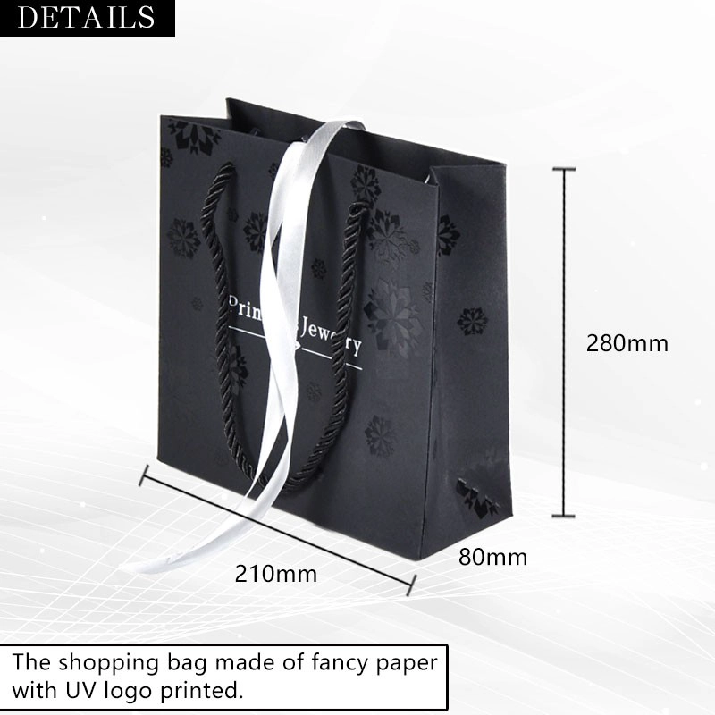 China YADAO  Luxury Holiday Bag Custom Logo Black Color CMYK New Design Cartoon Paper Bag for Clothes Gift Shopping manufacturer