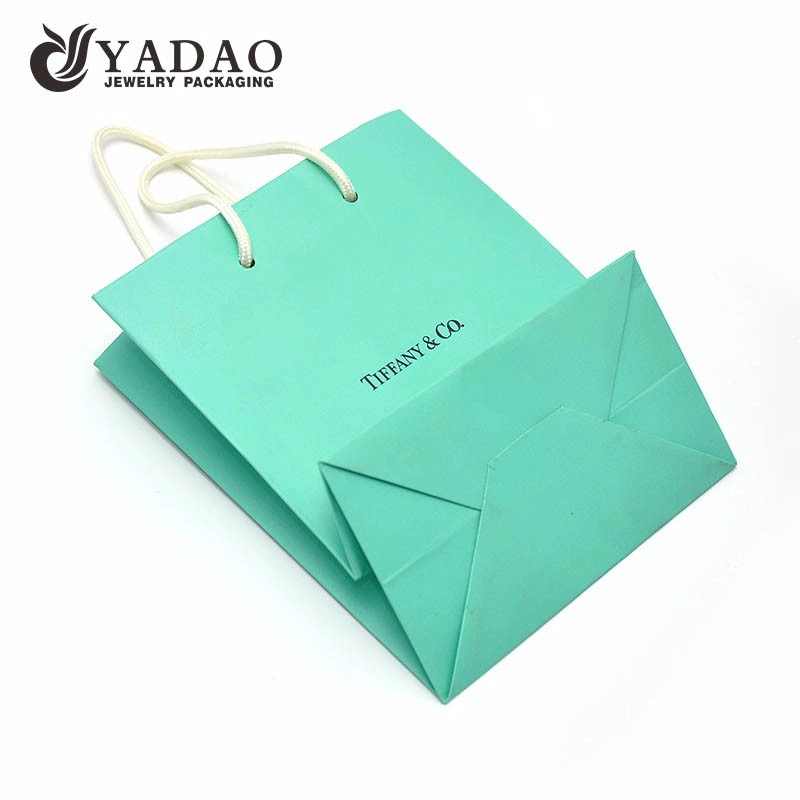 China Yadao CMYK paper bag spring color shopping bag for gift jewelry packaging bag with white rope handle manufacturer