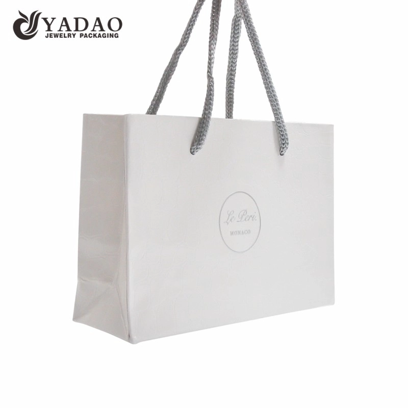 China Yadao Handmade Shopping Bag White Color Paper Bag with Twisted Rope and Printing Logo manufacturer