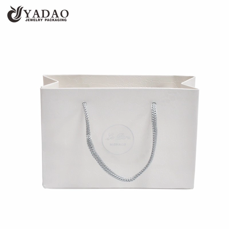 China Yadao Handmade Shopping Bag White Color Paper Bag with Twisted Rope and Printing Logo manufacturer