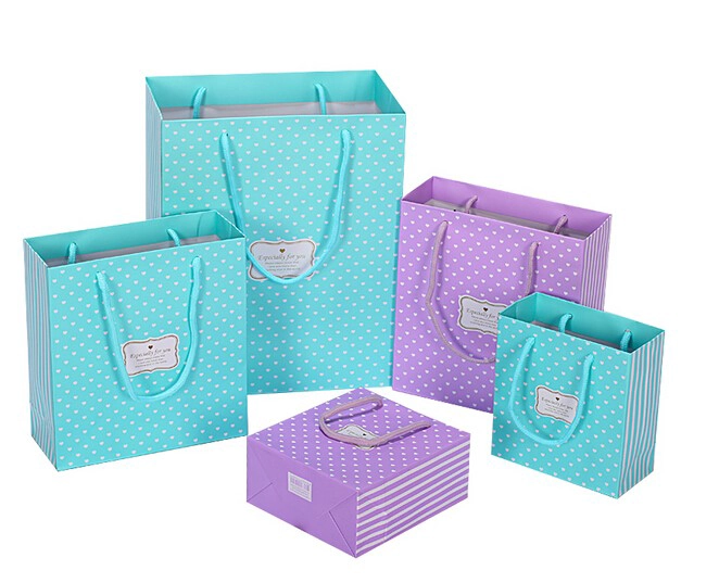 China customize artwork printing hand rope paper shopping bag packaging paper bag wholesales colorful gift bag manufacturer