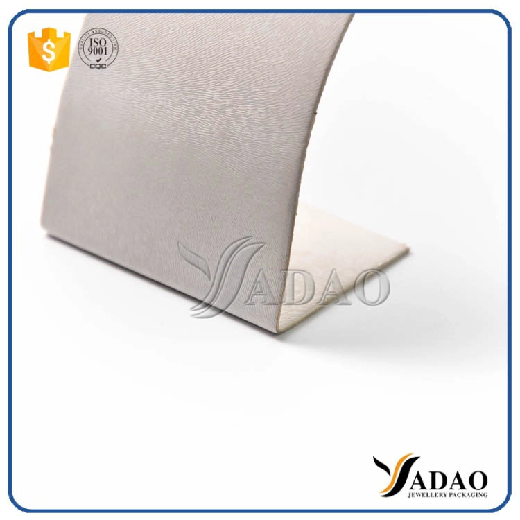 China thin affordable wholesale customized color flexible size metal leather double using jewelry holder for earring/ pendant manufacturer