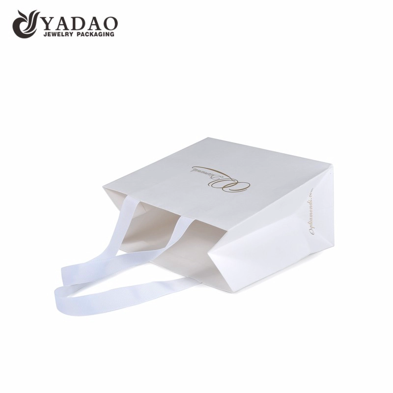 China white color fancy textured paper bag gift shopping bag paper jewelry packaging carrying manufacturer