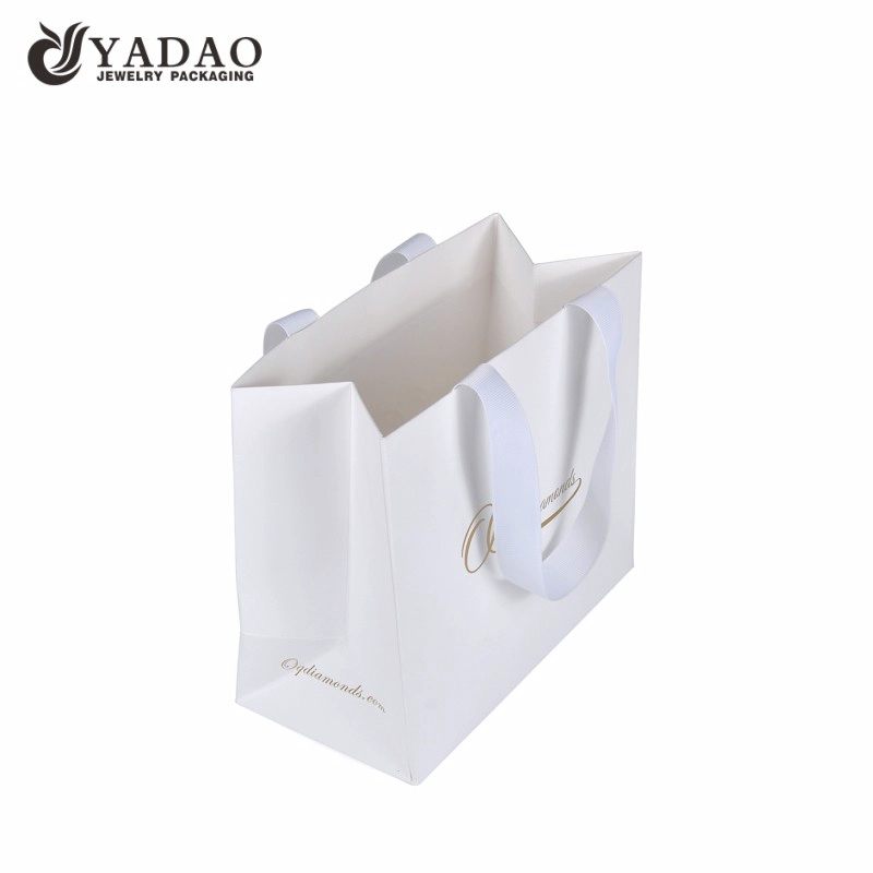 China white color fancy textured paper bag gift shopping bag paper jewelry packaging carrying manufacturer