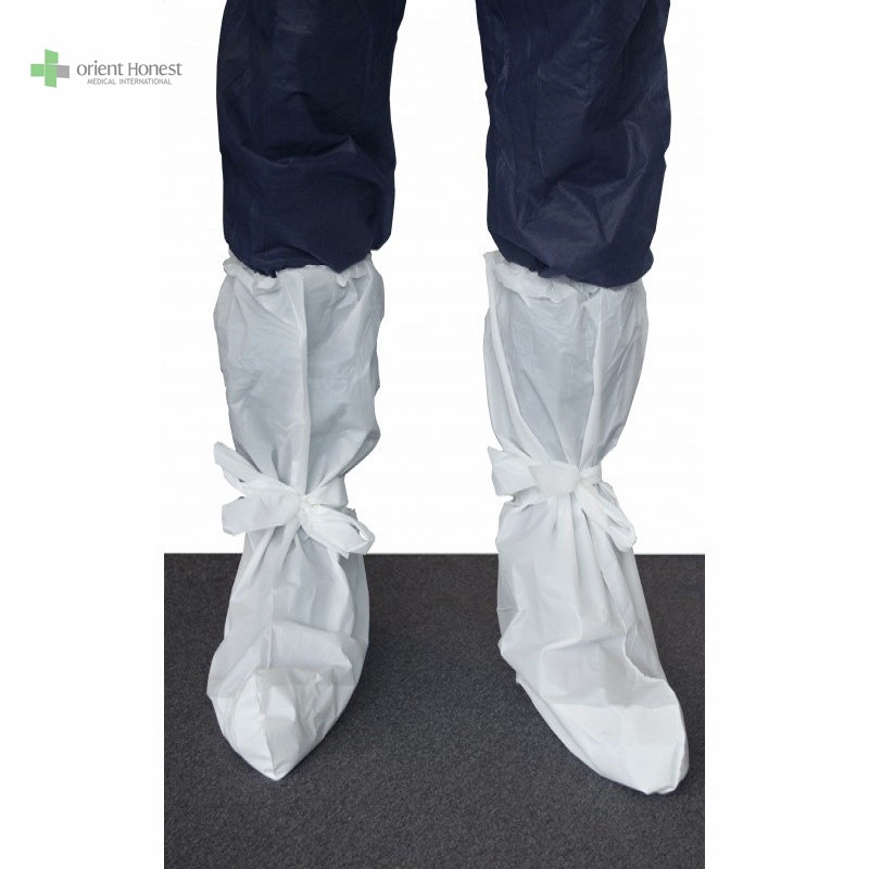Boot sekali pakai mencakup PPE Warna Putih Produsen Medis