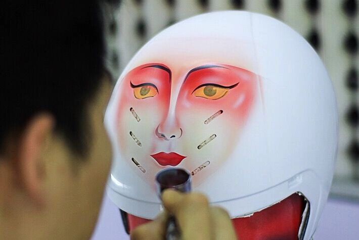 Opera masks on the helmet