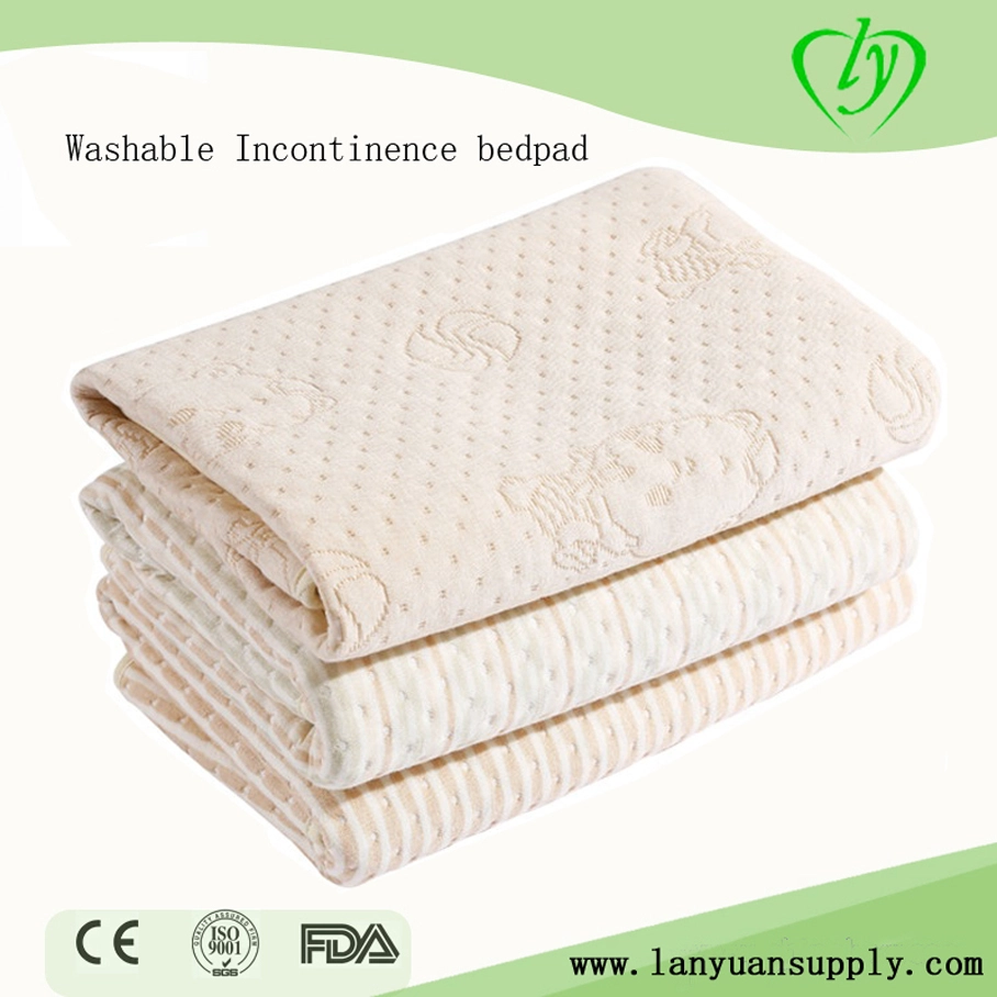 OEM colorido algodón lavable absorbente debajo de la almohadilla