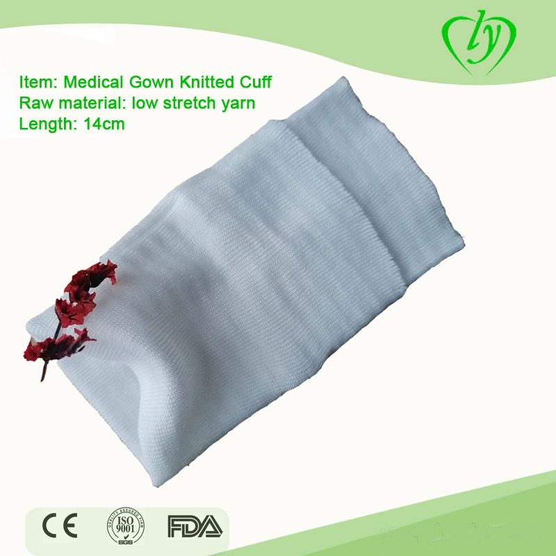 Cuff en tricot blanc jetable pour une robe d'isolation