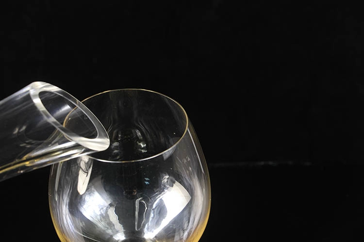 Glass decanter with hole